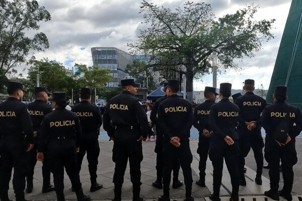 National Civil Police officers standing in a line in the historic centre of San Salvador