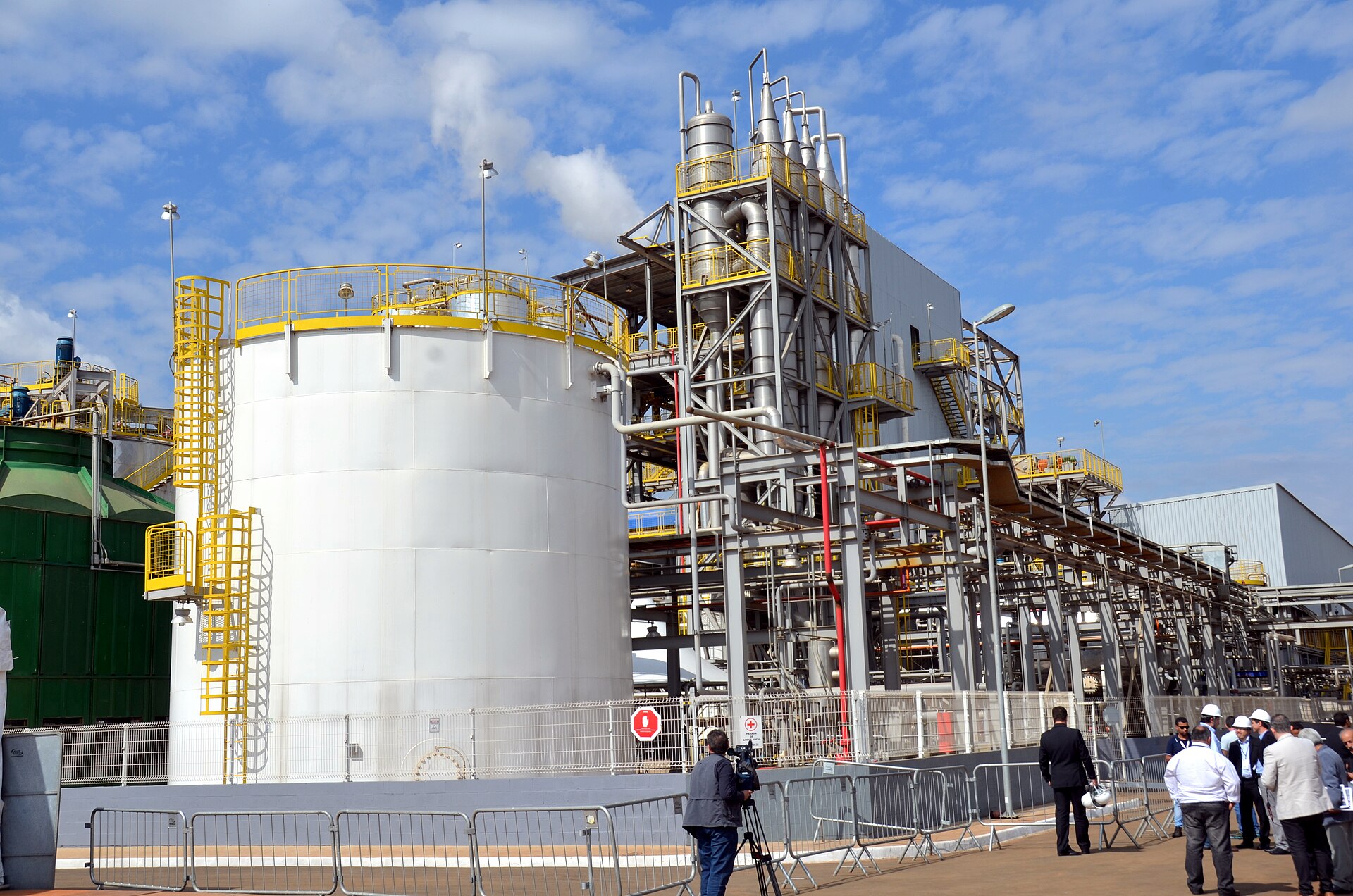 An ethanol plant with white storage tanks and pipework in Piracicaba, São Paulo state