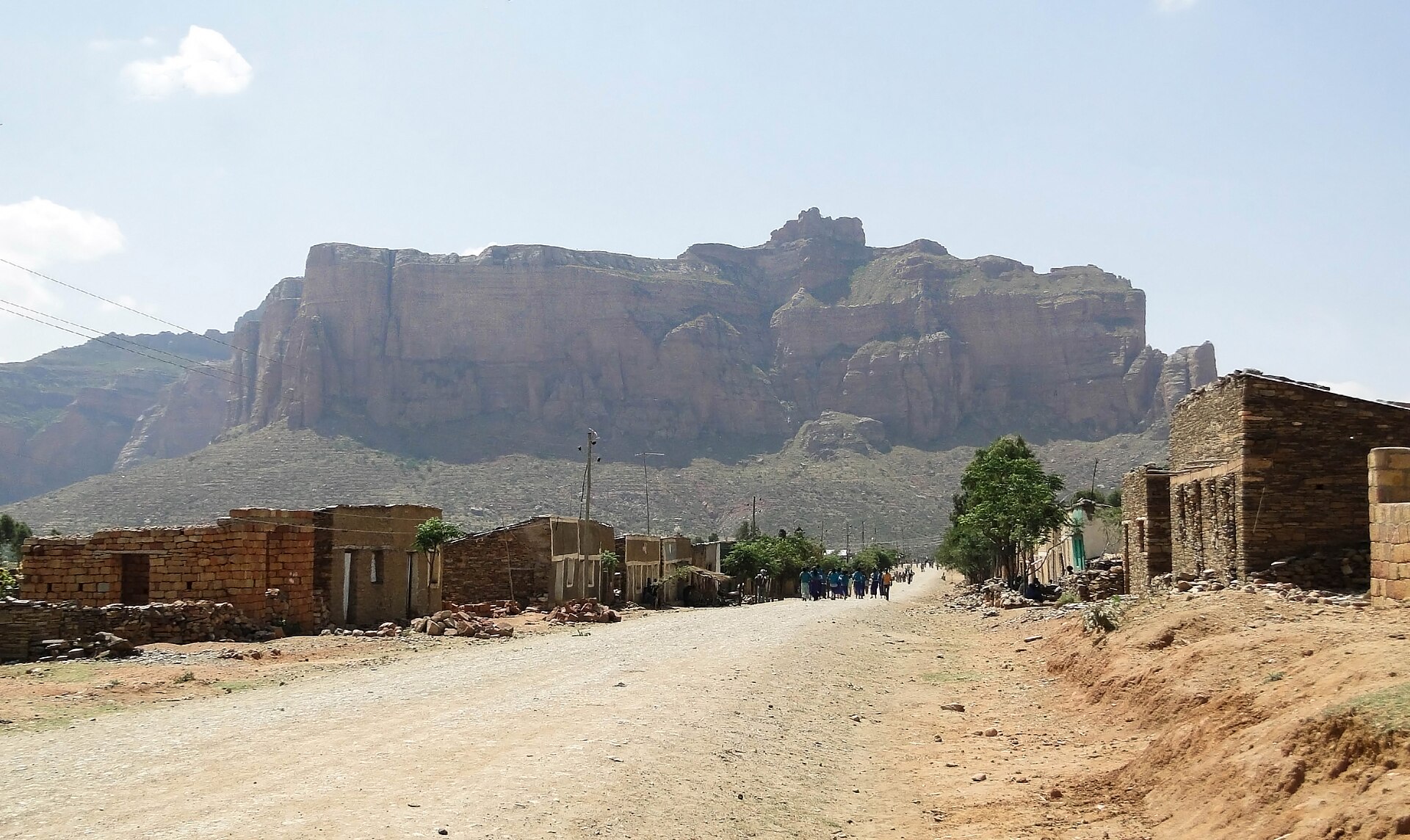 A dirt road through a village below the Gheralta cliffs in Tigray, Ethiopia