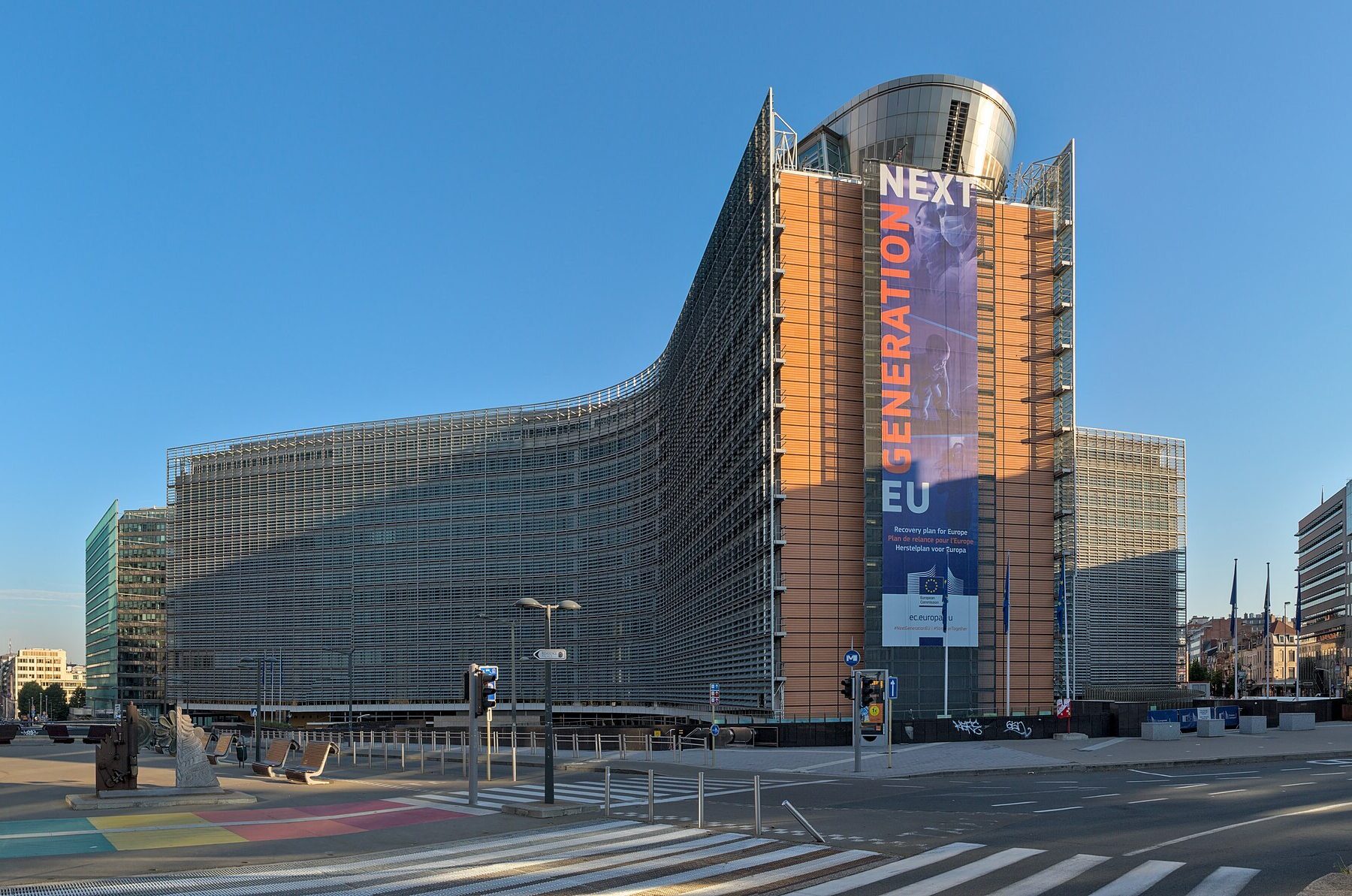The Berlaymont building in Brussels, headquarters of the European Commission, with EU flags