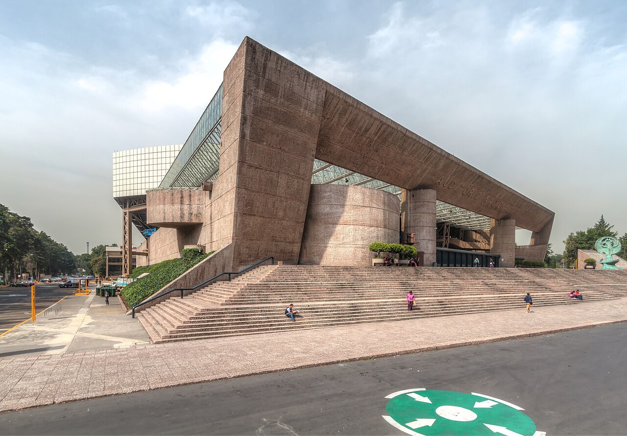 The concrete facade and wide front steps of the Auditorio Nacional on Paseo de la Reforma in Mexico City