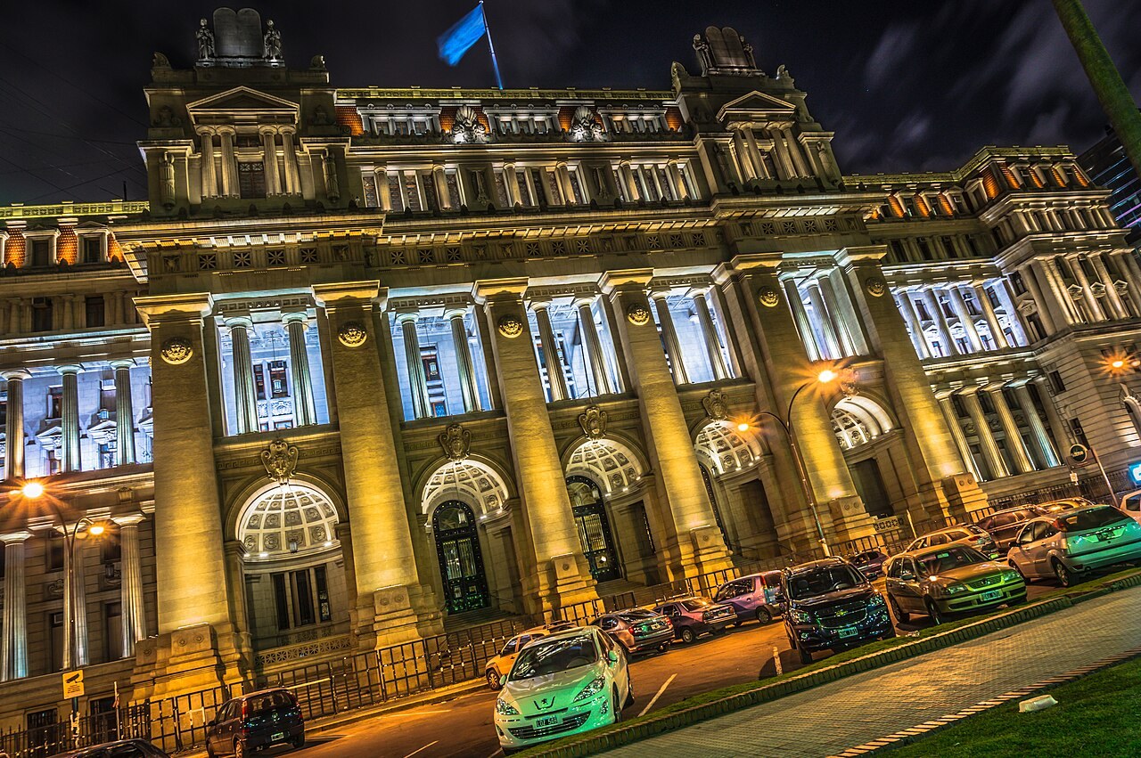 Argentina land law - The floodlit Palacio de Justicia in Buenos Aires at night, seat of Argentina's Supreme Court