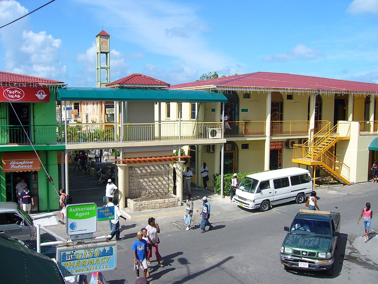 Antigua and Barbuda - A shopping street with a clock tower in St John's, Antigua