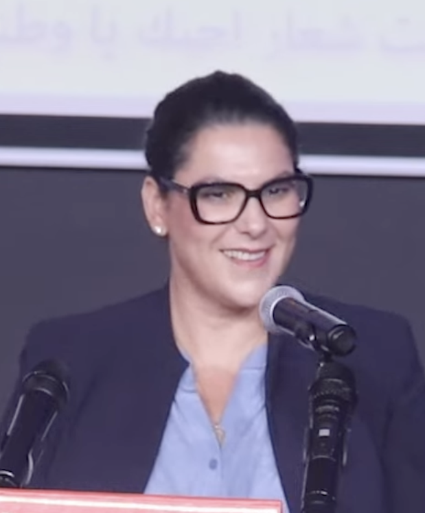 Fatima Ezzahra El Mansouri, Morocco’s head of government, speaking at a microphone