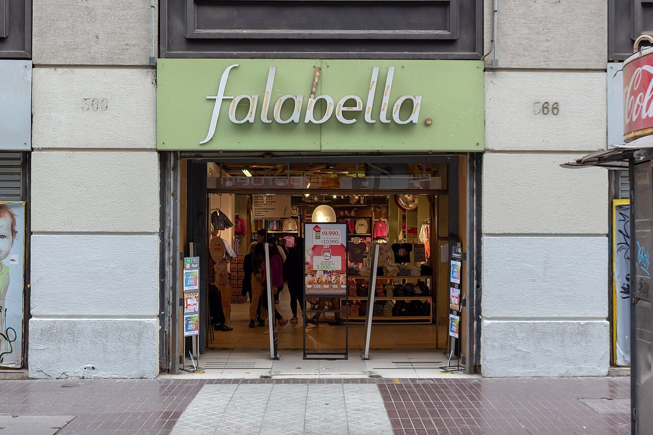 Entrance of a Falabella store with a green sign on a pedestrian street in central Santiago, Chile