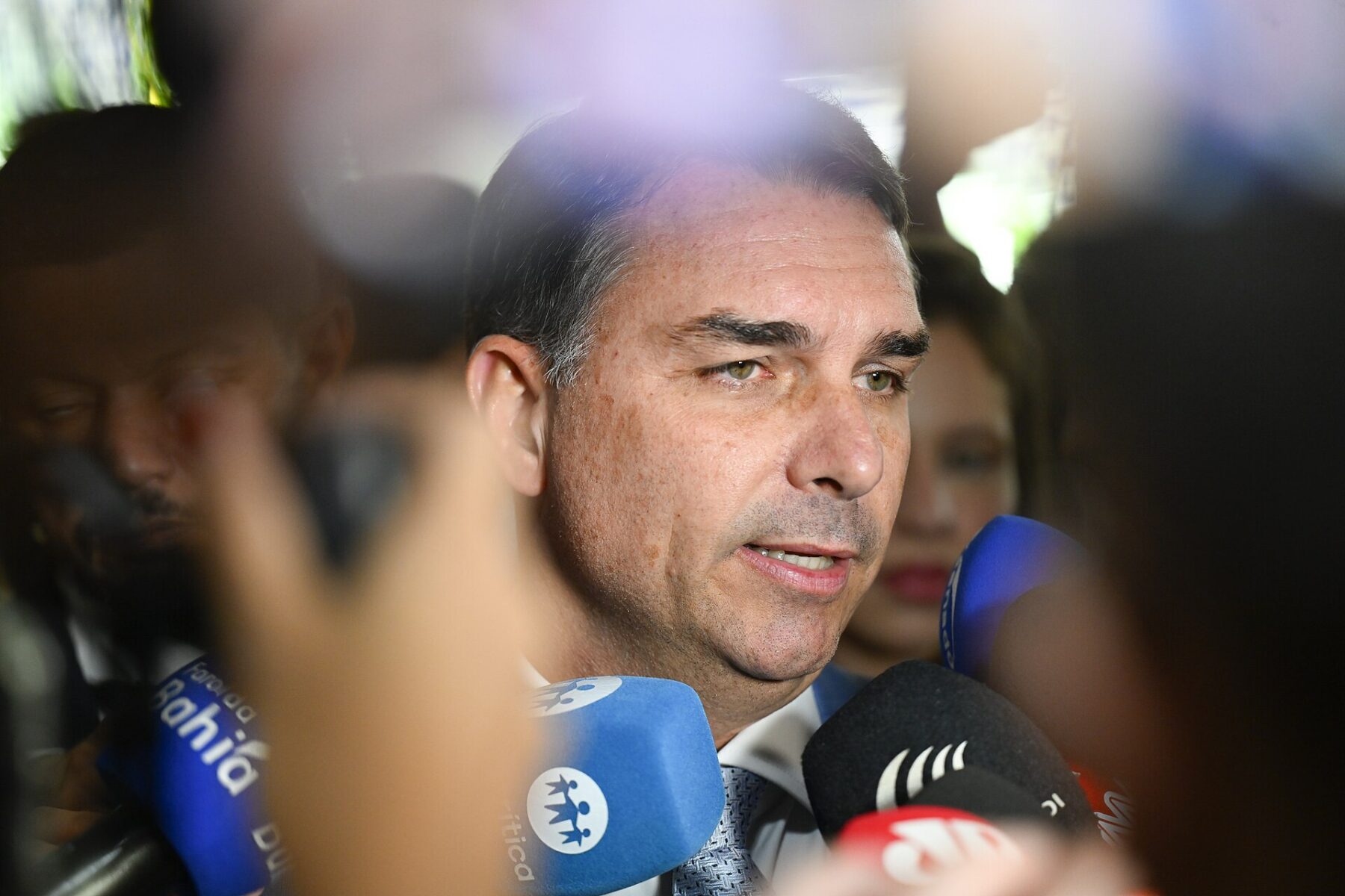 Senator Flávio Bolsonaro answers questions from reporters in Brasília
