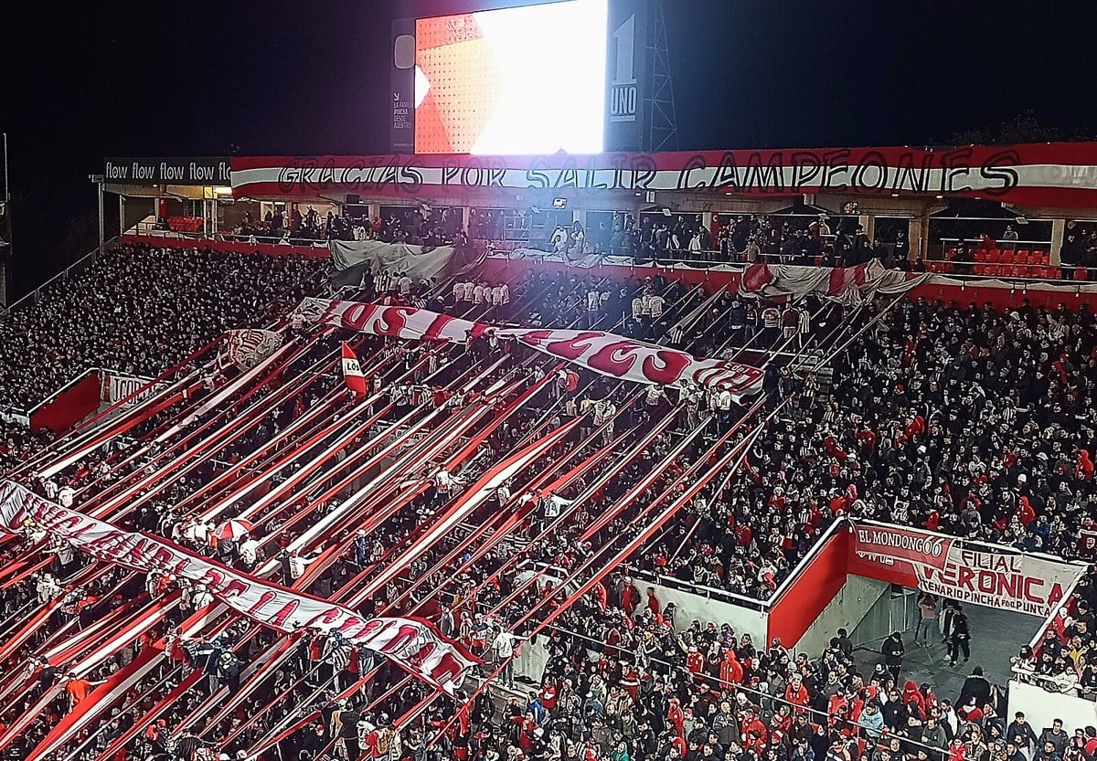 Estudiantes de La Plata supporters with streamers and banners at the club's Estadio UNO in La Plata, Argentina