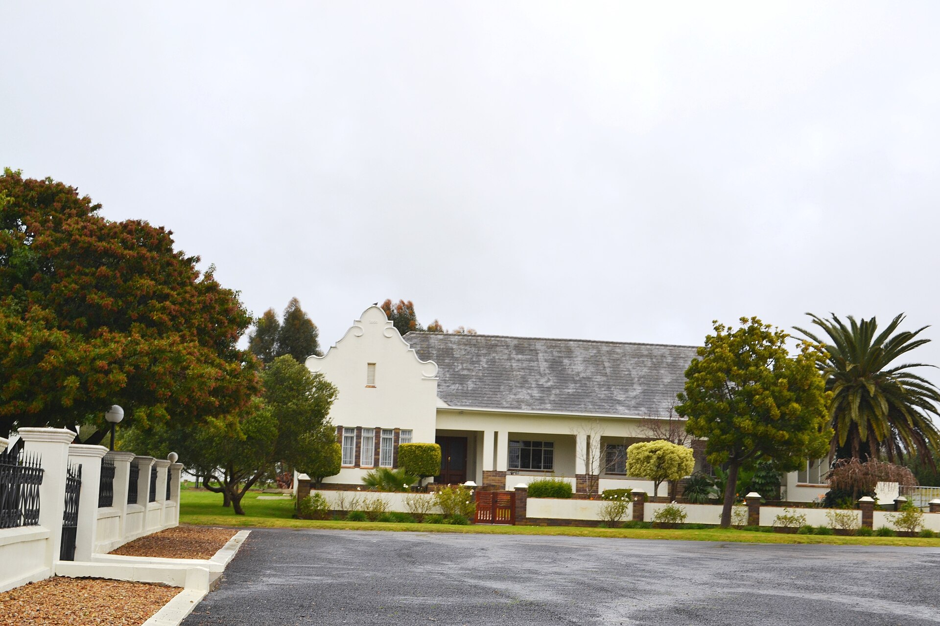 Cape Dutch gabled building and gardens on Church Street in Philadelphia, the farming village near The Ostrich north of Cape Town