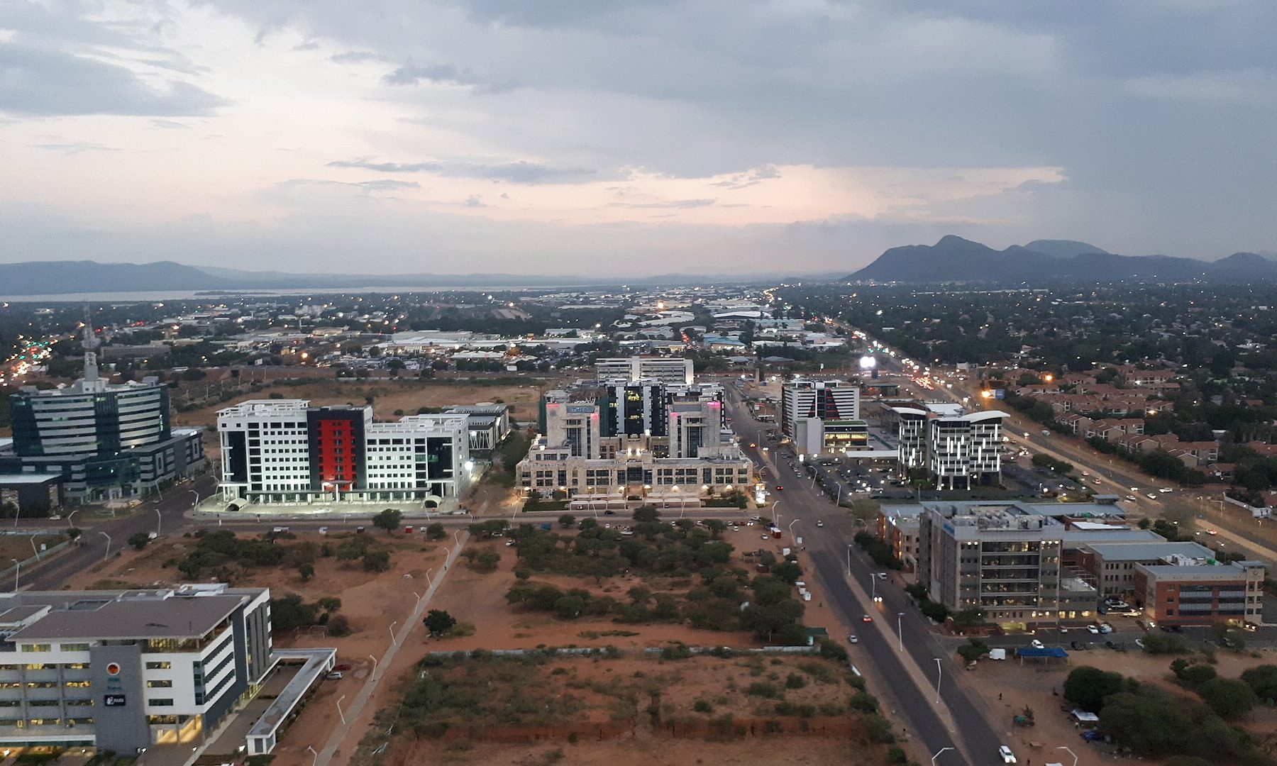 Aerial view of office towers in the new Central Business District of Gaborone, Botswana, at dusk