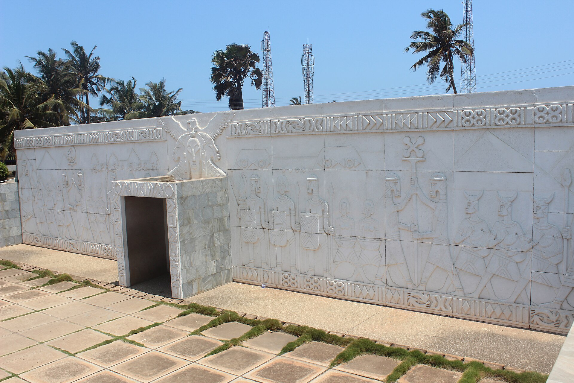 Ghana geopolitics: carved relief wall at the Kwame Nkrumah Memorial Park in Accra