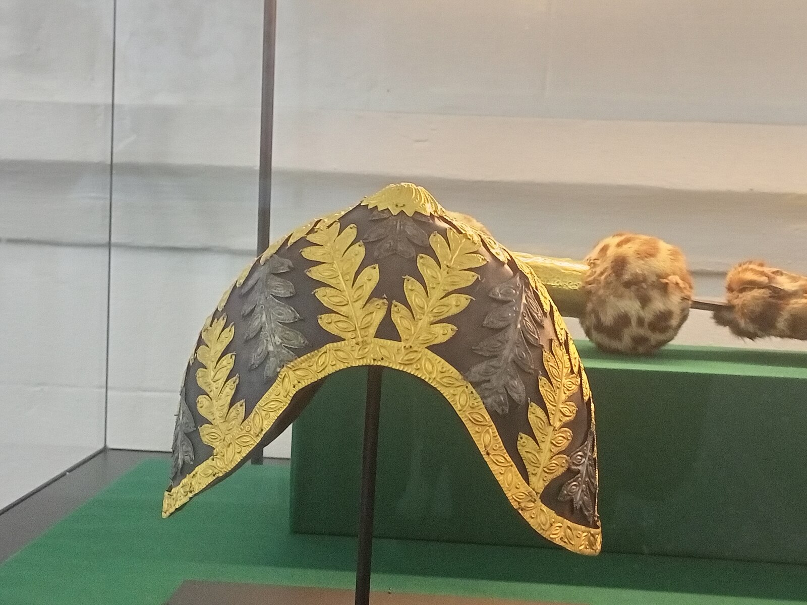 Gold-decorated Asante helmet at the Manhyia Palace Museum, a relic of Ghana history in Kumasi