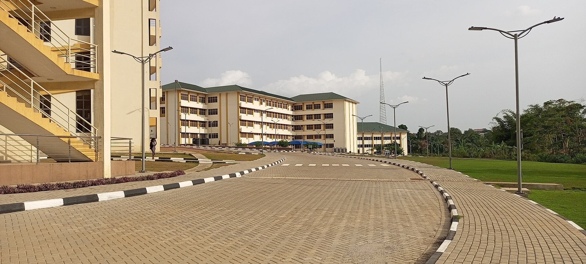 New Social Science block at KNUST in Kumasi, Ghana, with paved walkways and street lamps