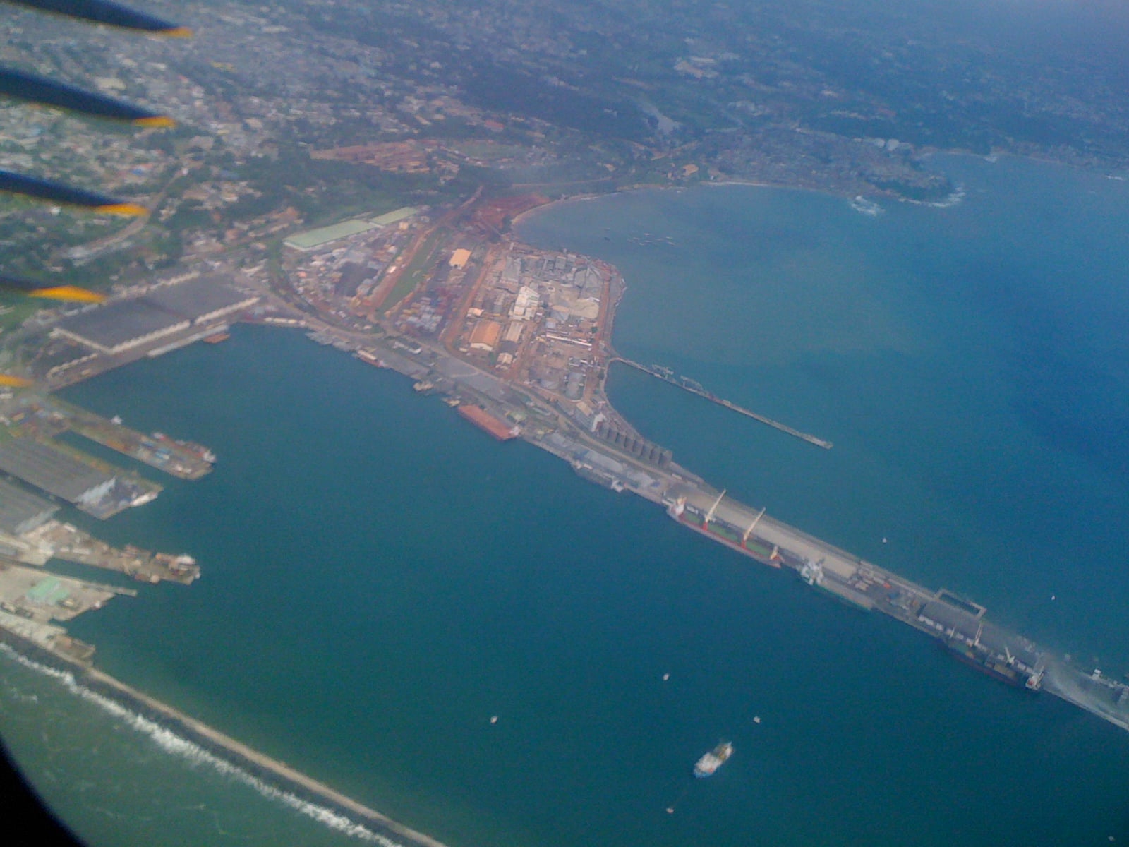 Aerial view of Takoradi Harbour and its breakwater in Ghana