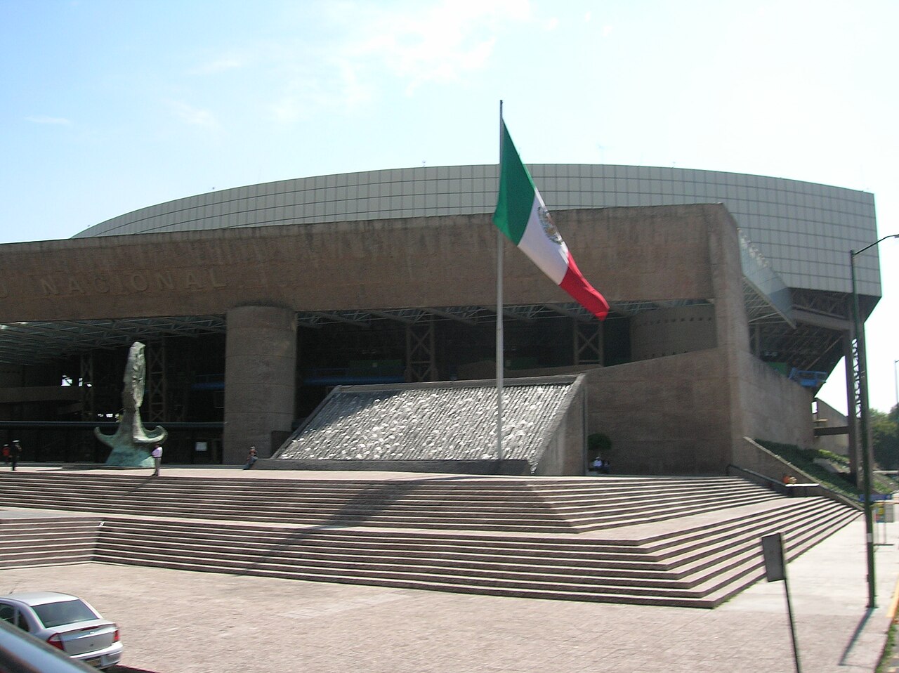 Front of the Auditorio Nacional concert hall in Mexico City with the Mexican flag
