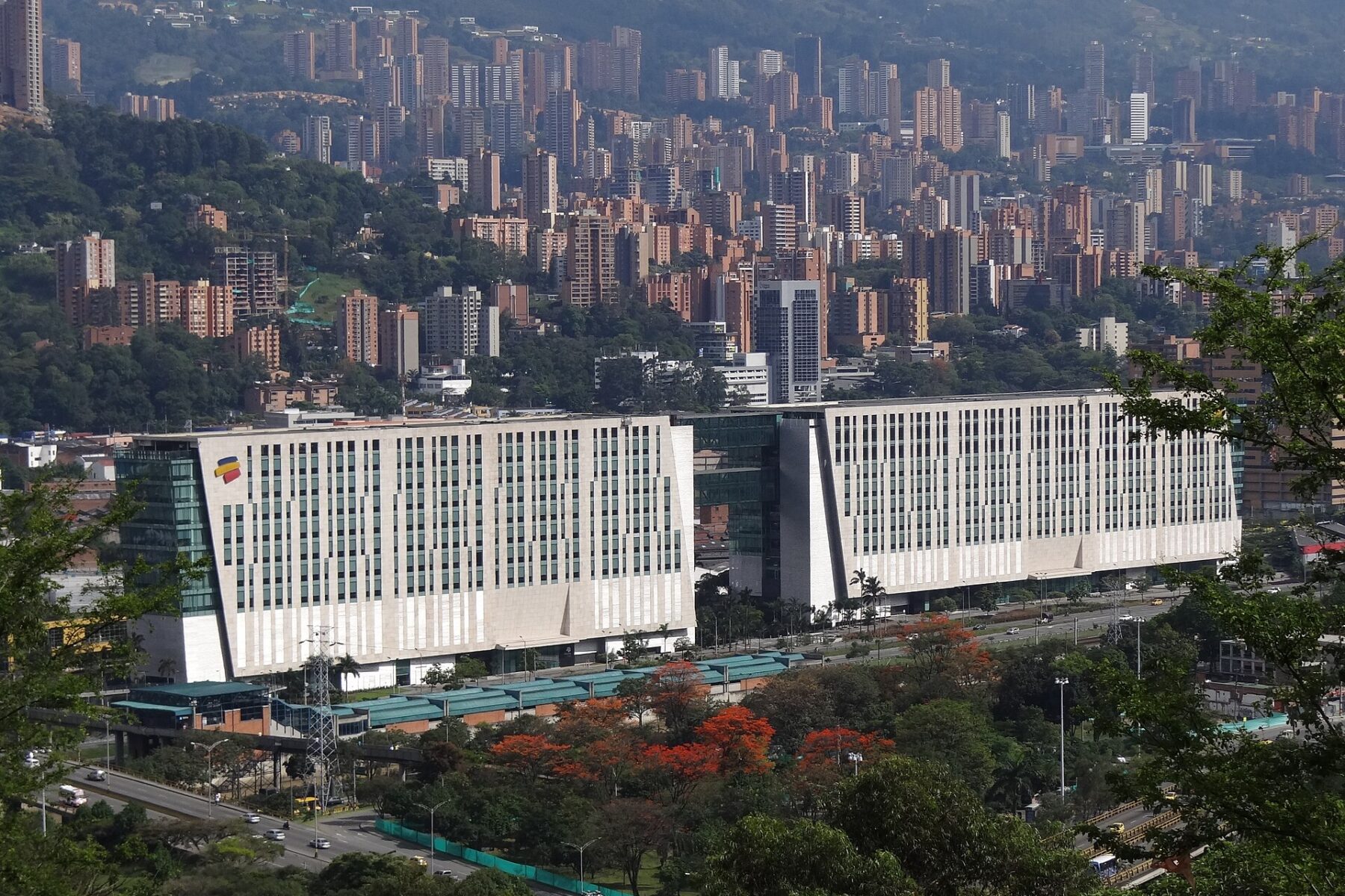 Bancolombia headquarters towers in Medellín, Colombia, with the city skyline behind