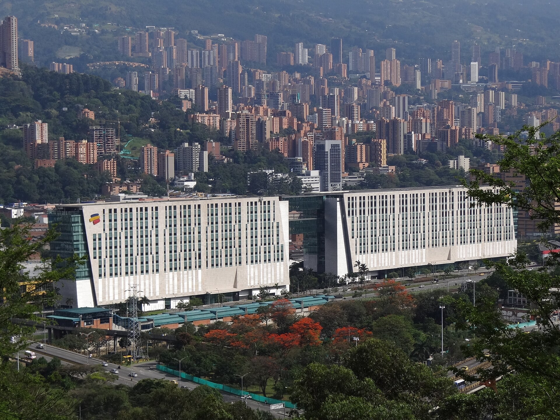 Bancolombia headquarters towers in Medellín, Colombia, with the city skyline behind