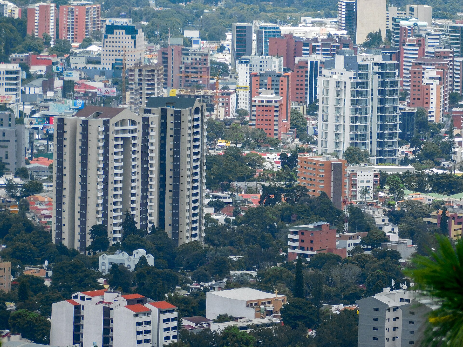 High-rise buildings in Zona 10 of Guatemala City seen from a hillside