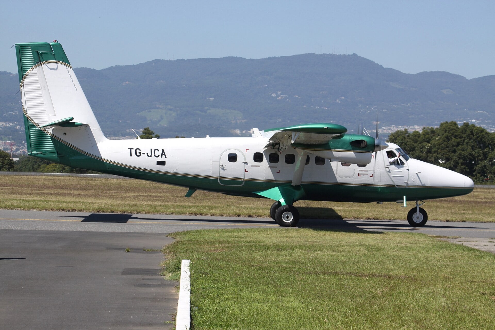 A DHC-6 Twin Otter turboprop taxiing at La Aurora International Airport in Guatemala City, Guatemala