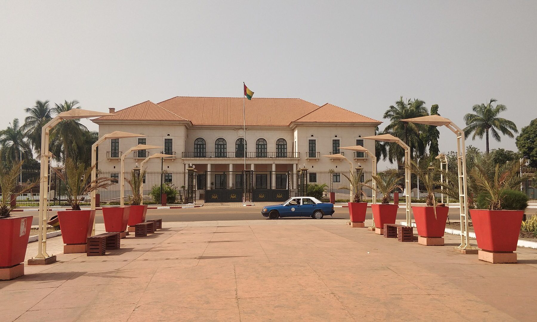 Presidential Palace in Bissau, Guinea-Bissau, with the national flag on the roof
