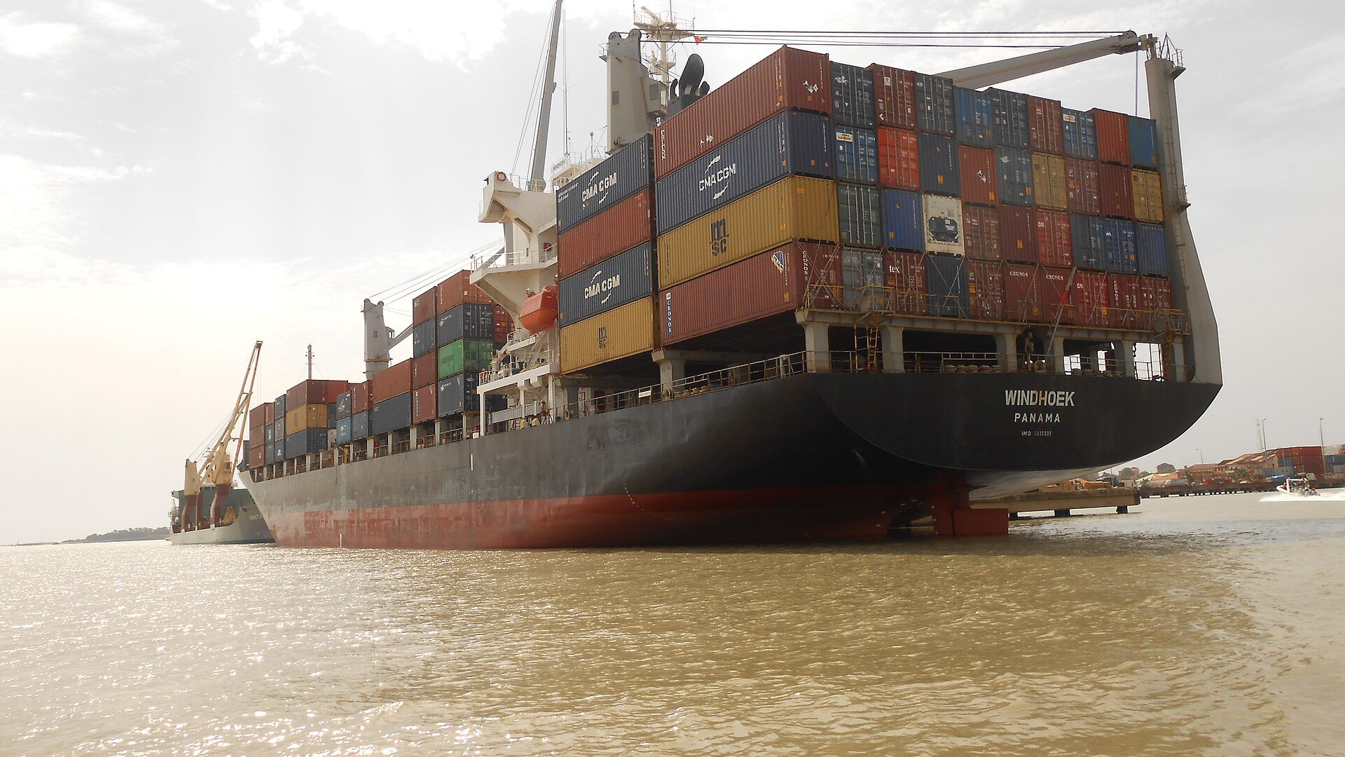 A container ship alongside a quay in the port of Bissau.