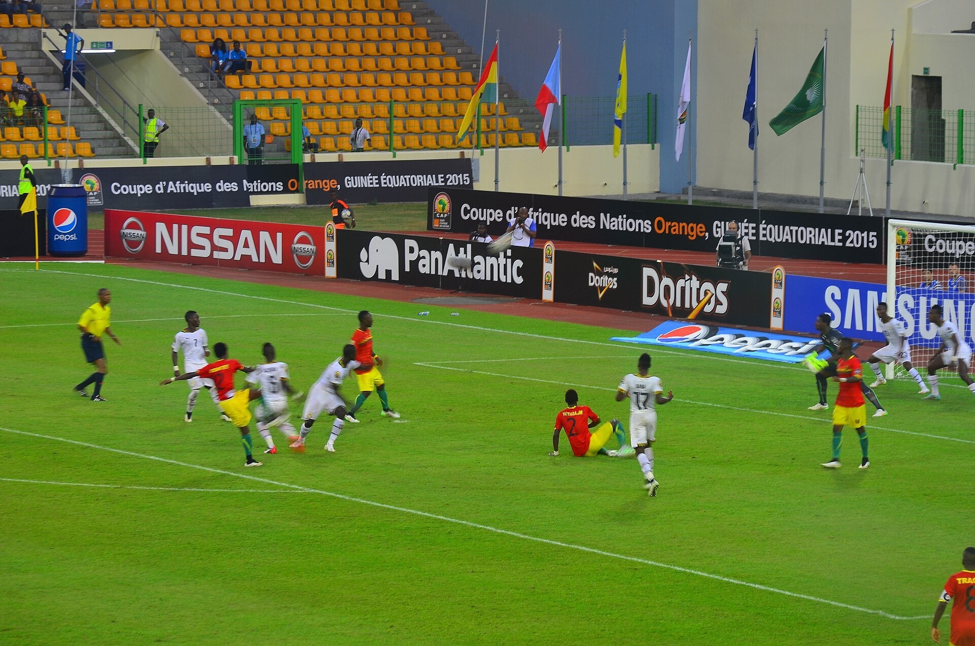 Guinea and Ghana players contest a ball in the penalty area during an Africa Cup of Nations quarterfinal in Malabo in 2015