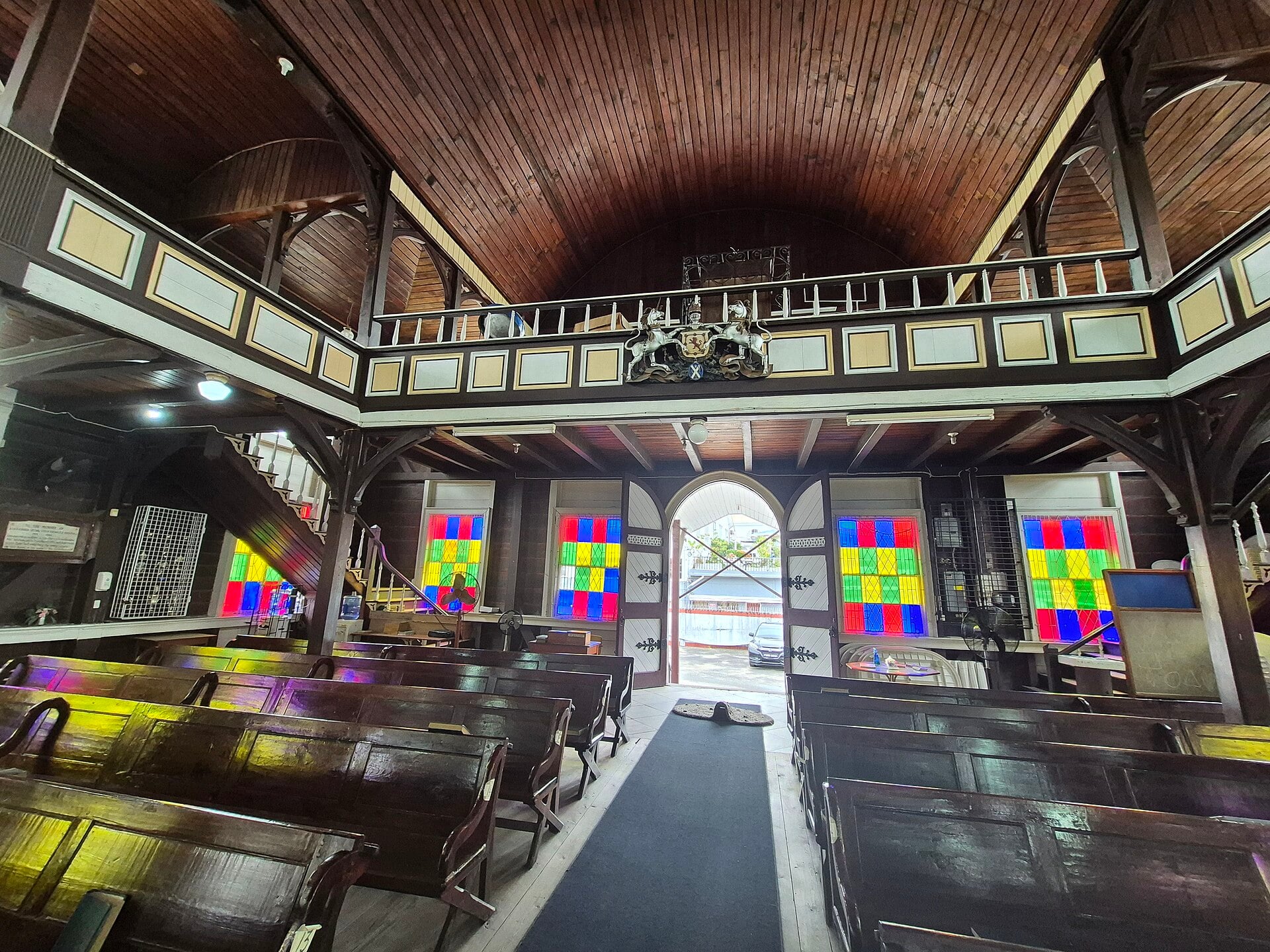 Pews, galleries and stained-glass windows inside St Andrew’s Kirk in Georgetown, Guyana