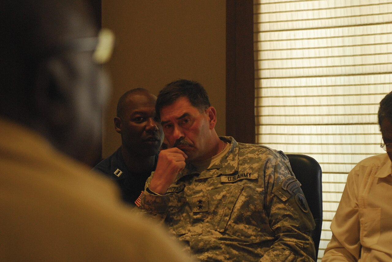 A US Army major general listens during a meeting with local leaders in Cap-Haïtien, Haiti, in 2010