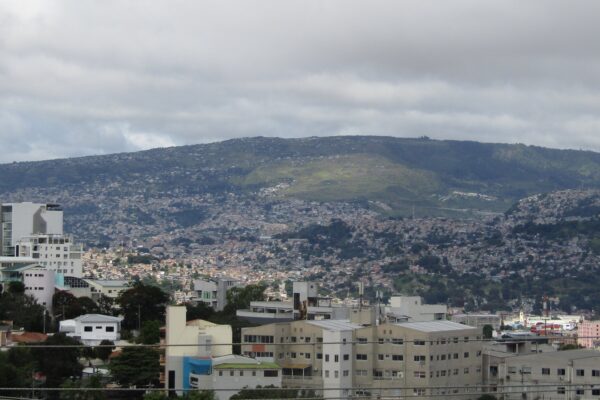 Hillside neighbourhoods of Tegucigalpa, the capital of Honduras, below the Pedregal hill under a cloudy sky