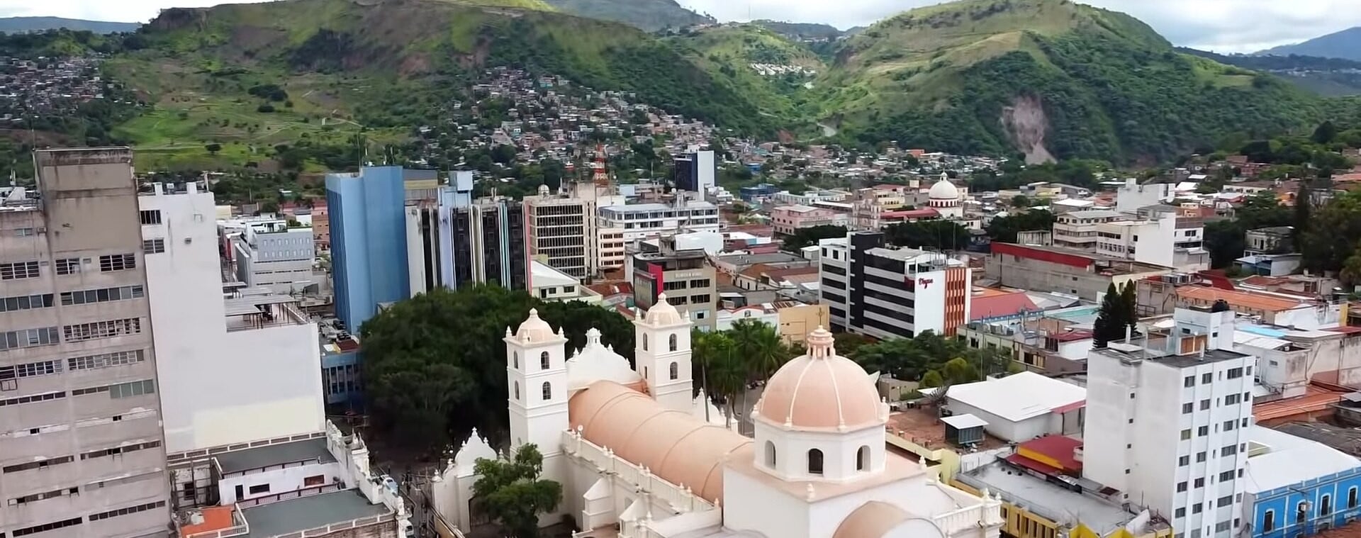 Aerial view of the central park and historic centre of Tegucigalpa, Honduras, with green hills behind