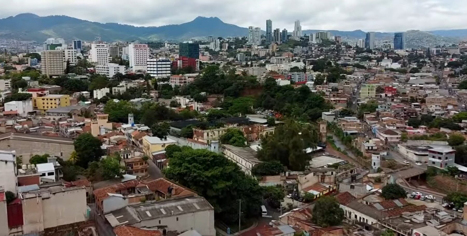 Aerial view of Tegucigalpa, the capital of Honduras, with downtown buildings and mountains behind