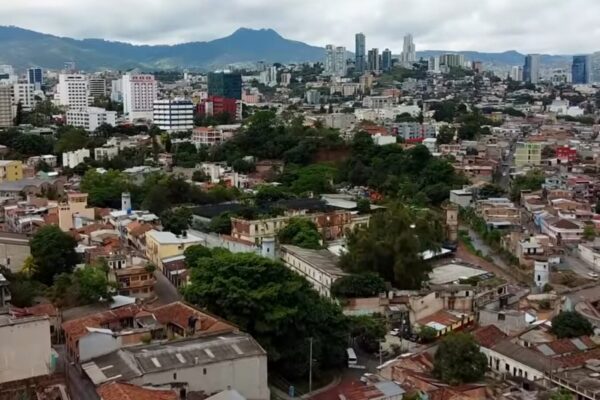 Aerial view of Tegucigalpa, the capital of Honduras, with downtown buildings and mountains behind