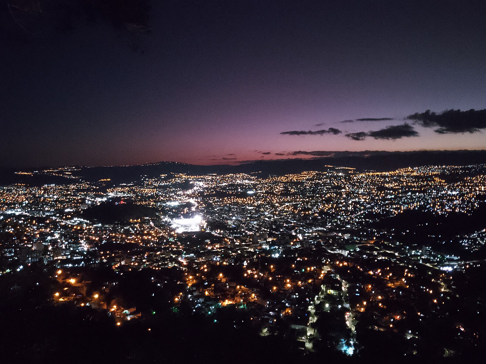 Honduras continent-wide: Tegucigalpa at dusk, seen from the hills above the capital