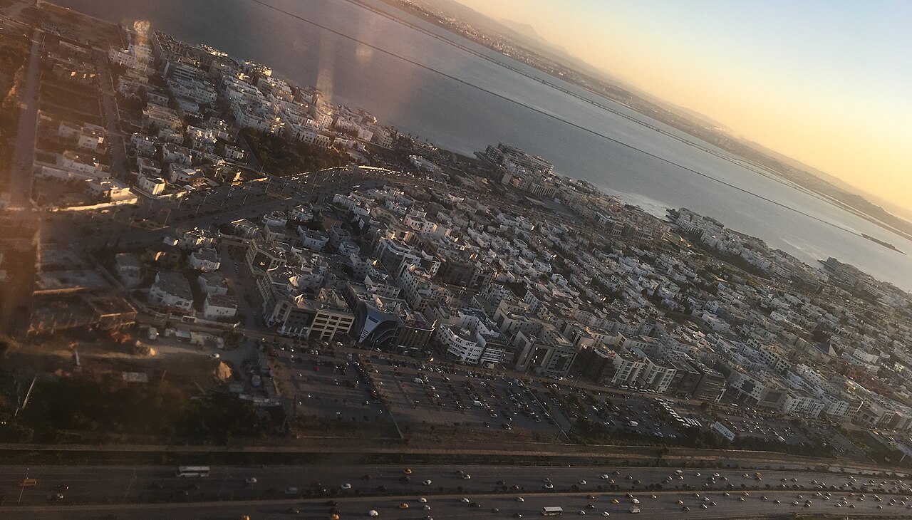 Aerial view of the Les Berges du Lac 1 district of Tunis with white office and apartment blocks beside the Lake of Tunis