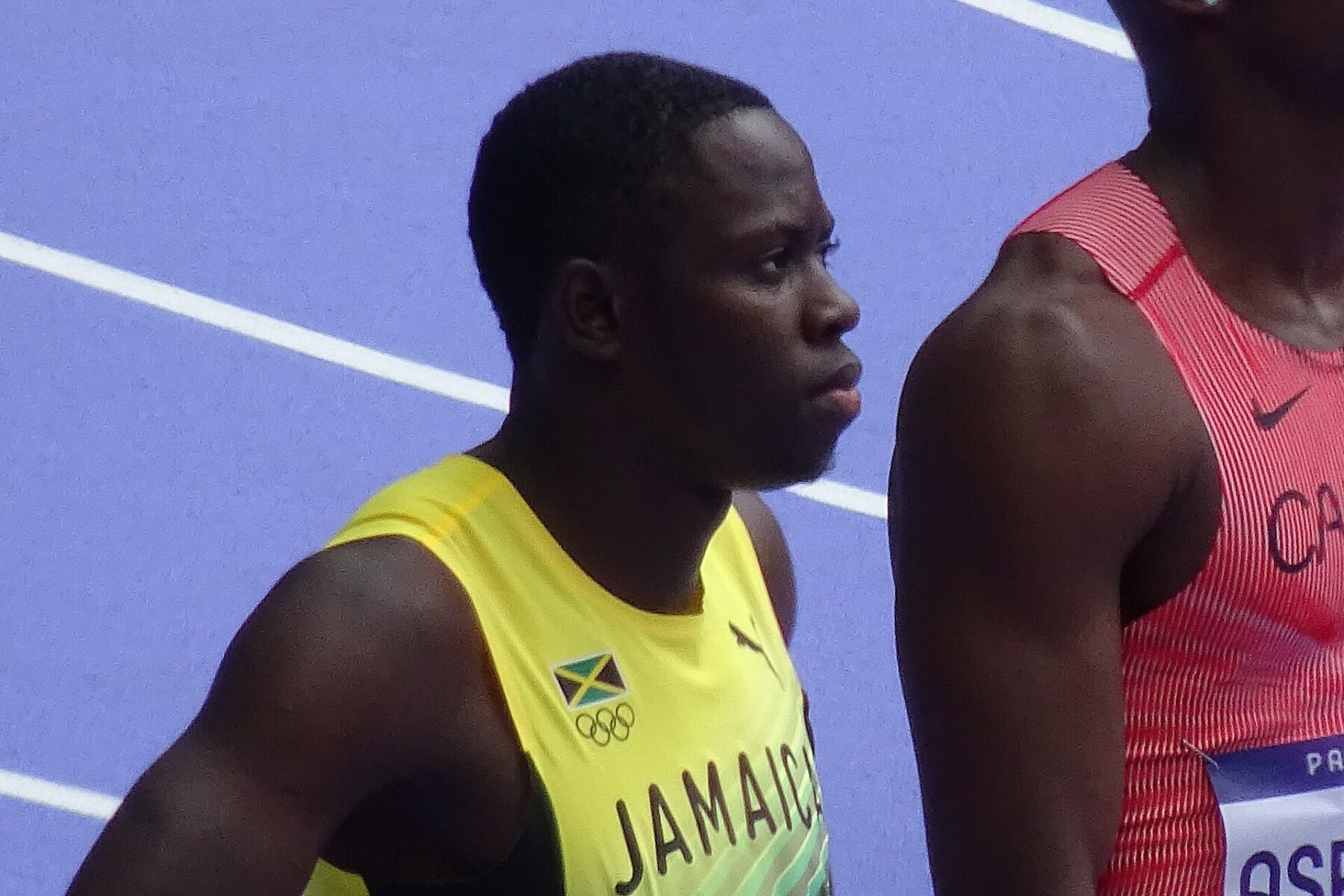 Oblique Seville of Jamaica in a yellow Jamaica vest at the Paris 2024 Olympics