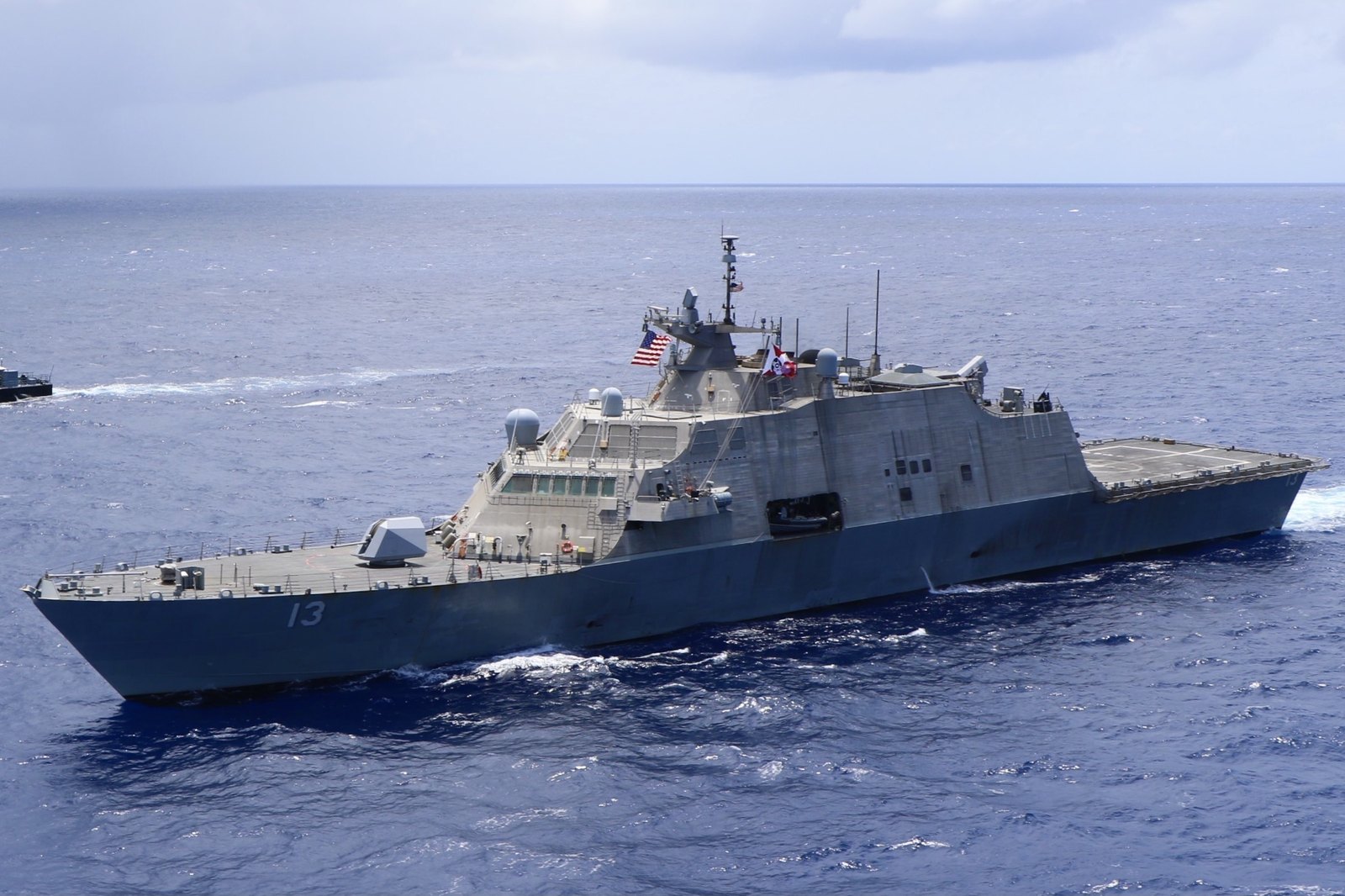 Jamaica neighbourhood at sea: USS Wichita sails with a Jamaica Defence Force Coast Guard patrol vessel in the Caribbean