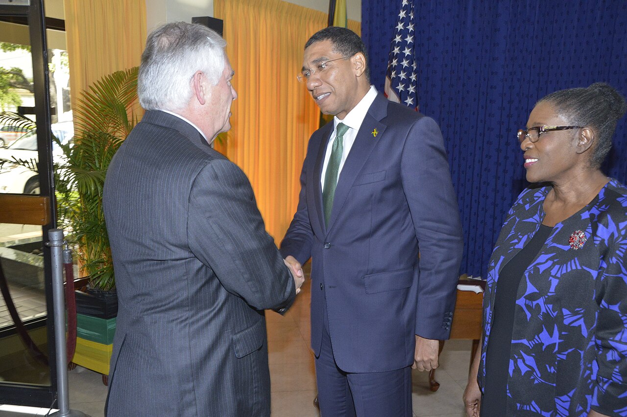 Prime Minister Andrew Holness shakes hands with US Secretary of State Rex Tillerson in a Kingston government building.