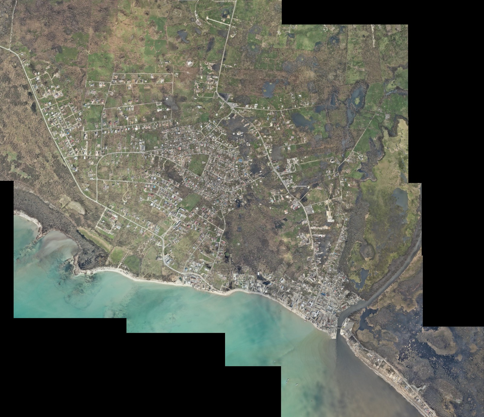 Is Jamaica a third world country: aerial view of Black River after Hurricane Melissa