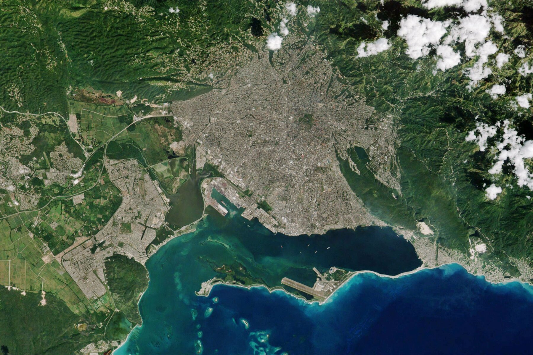 Jamaica drought: satellite view of Kingston and Portmore between the green hills of St Andrew and Kingston Harbour