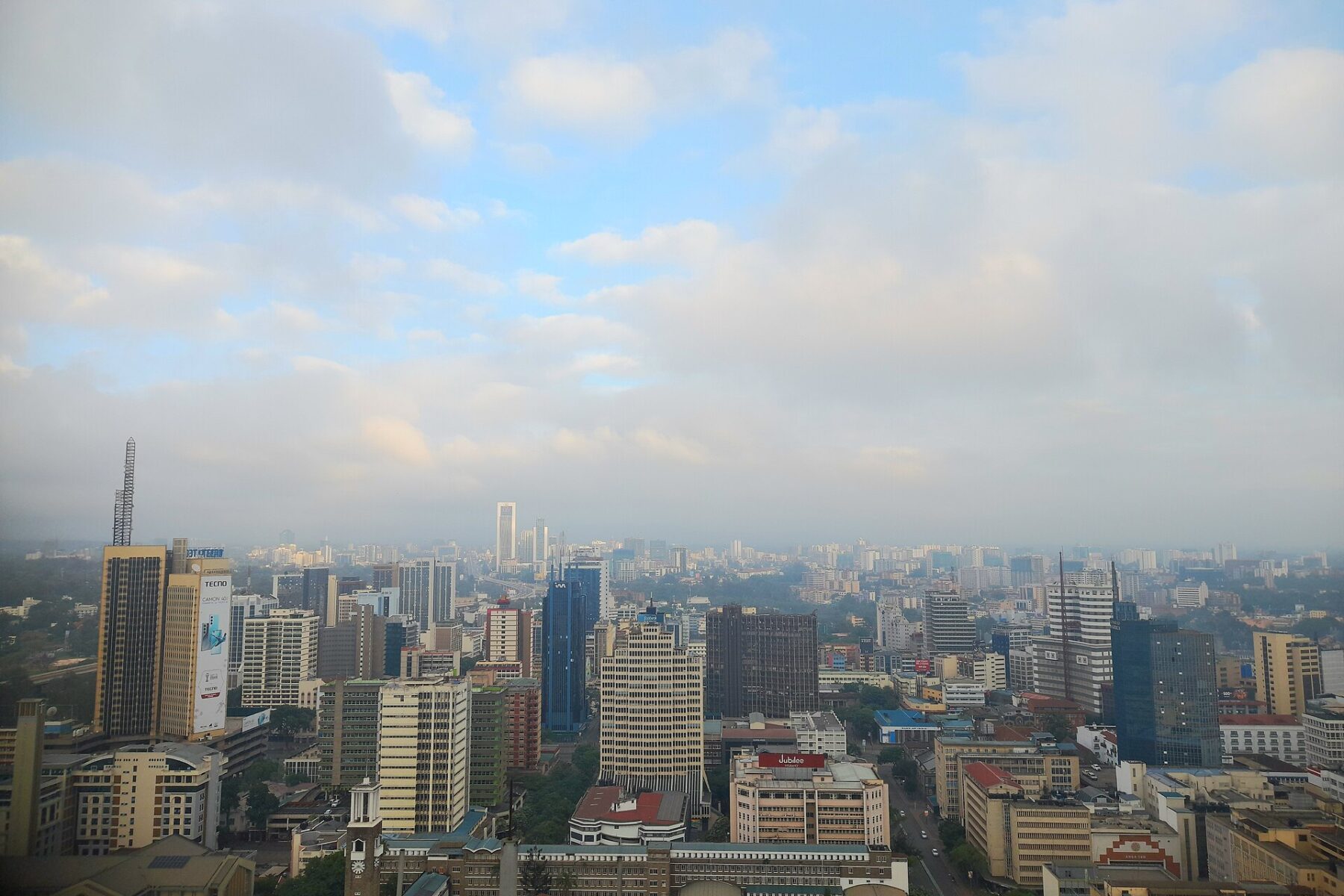 The Nairobi city centre skyline under morning cloud, seen from above