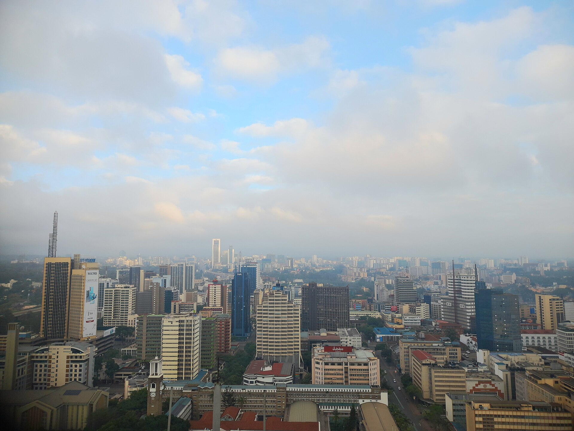 The Nairobi city centre skyline under morning cloud, seen from above