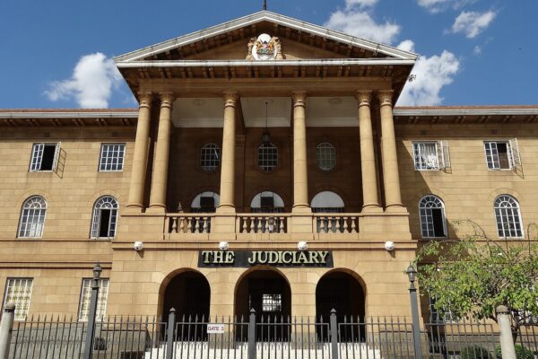 The Judiciary building in central Nairobi, with its columned entrance and the sign The Judiciary
