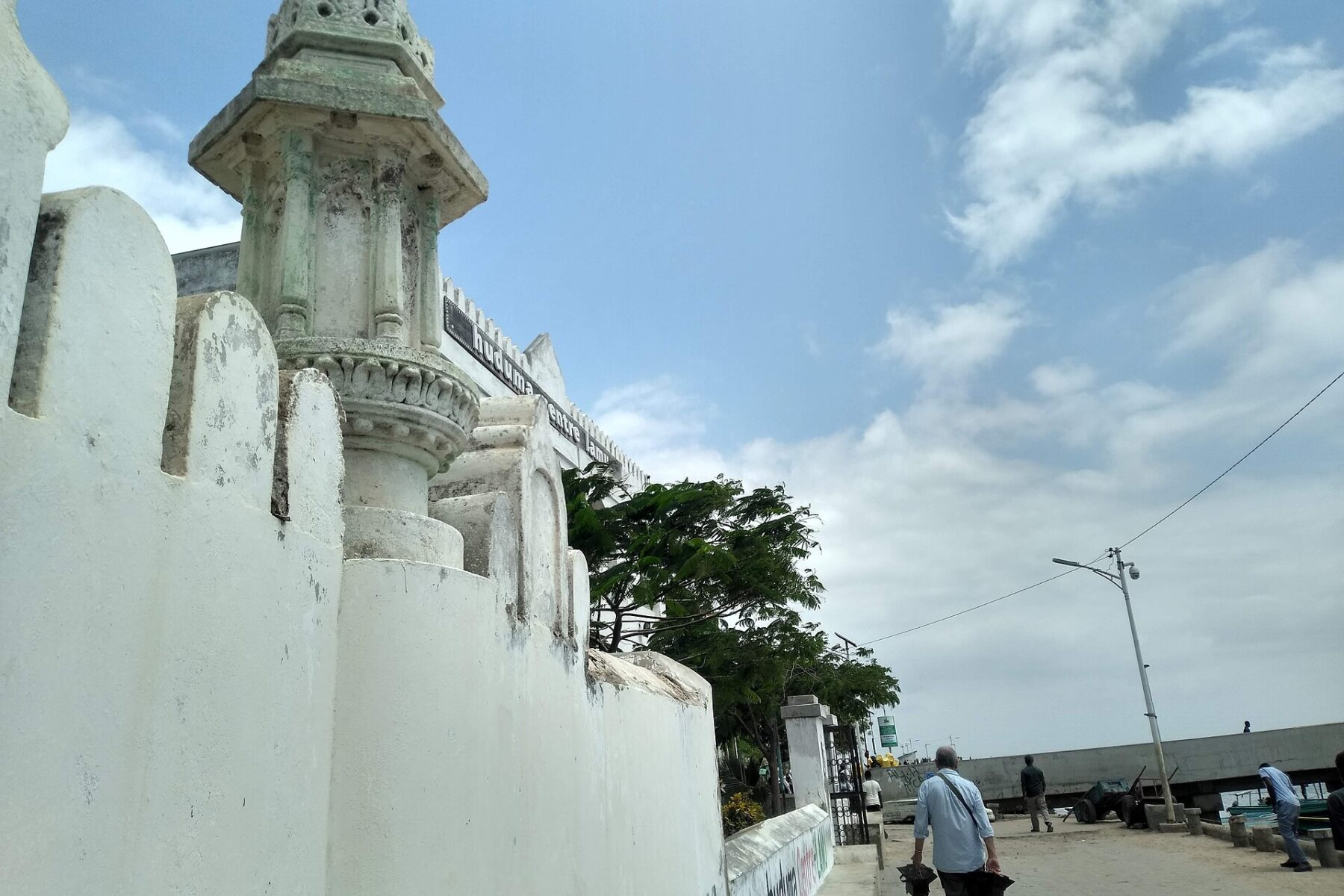 Kenya religion: a mosque minaret on the sea front in Lamu