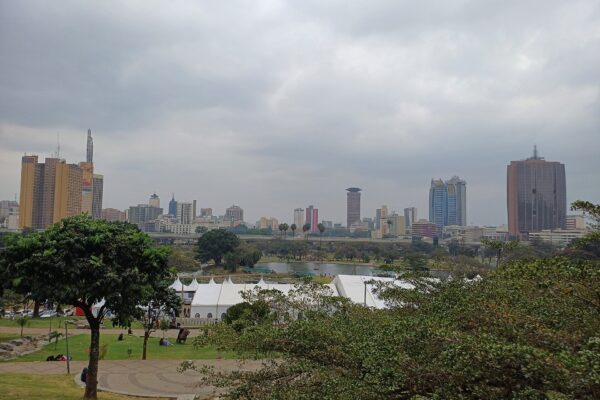 The Nairobi skyline seen across Uhuru Park, with the KICC tower at centre