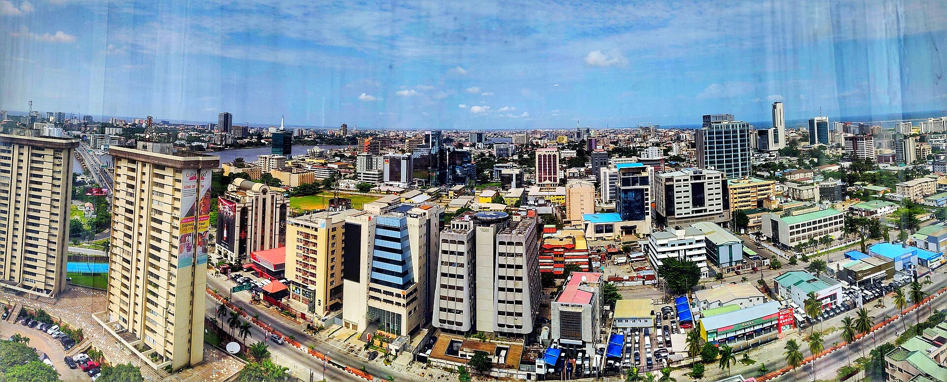 Panoramic view over Victoria Island, Lagos, with office towers and the lagoon