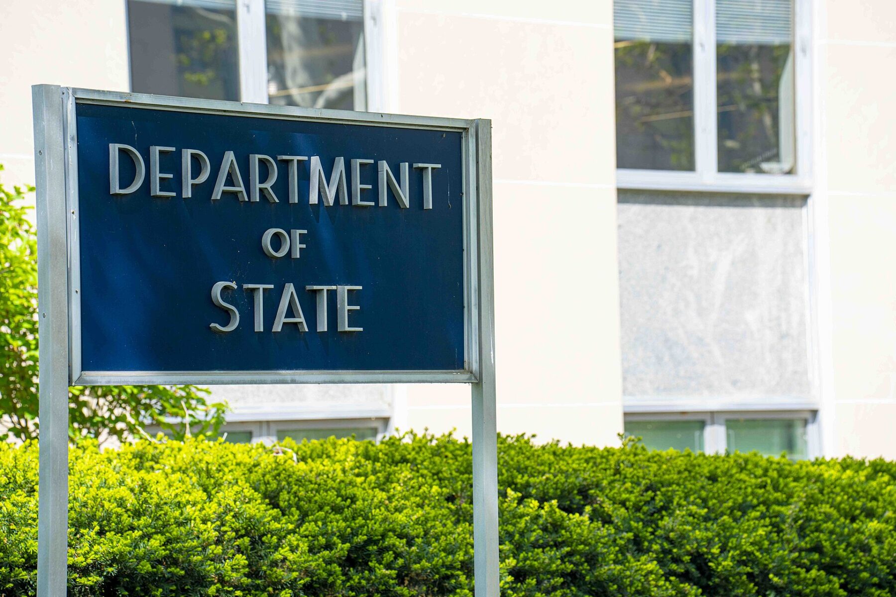 A Department of State sign outside the Harry S. Truman Building in Washington, D.C.