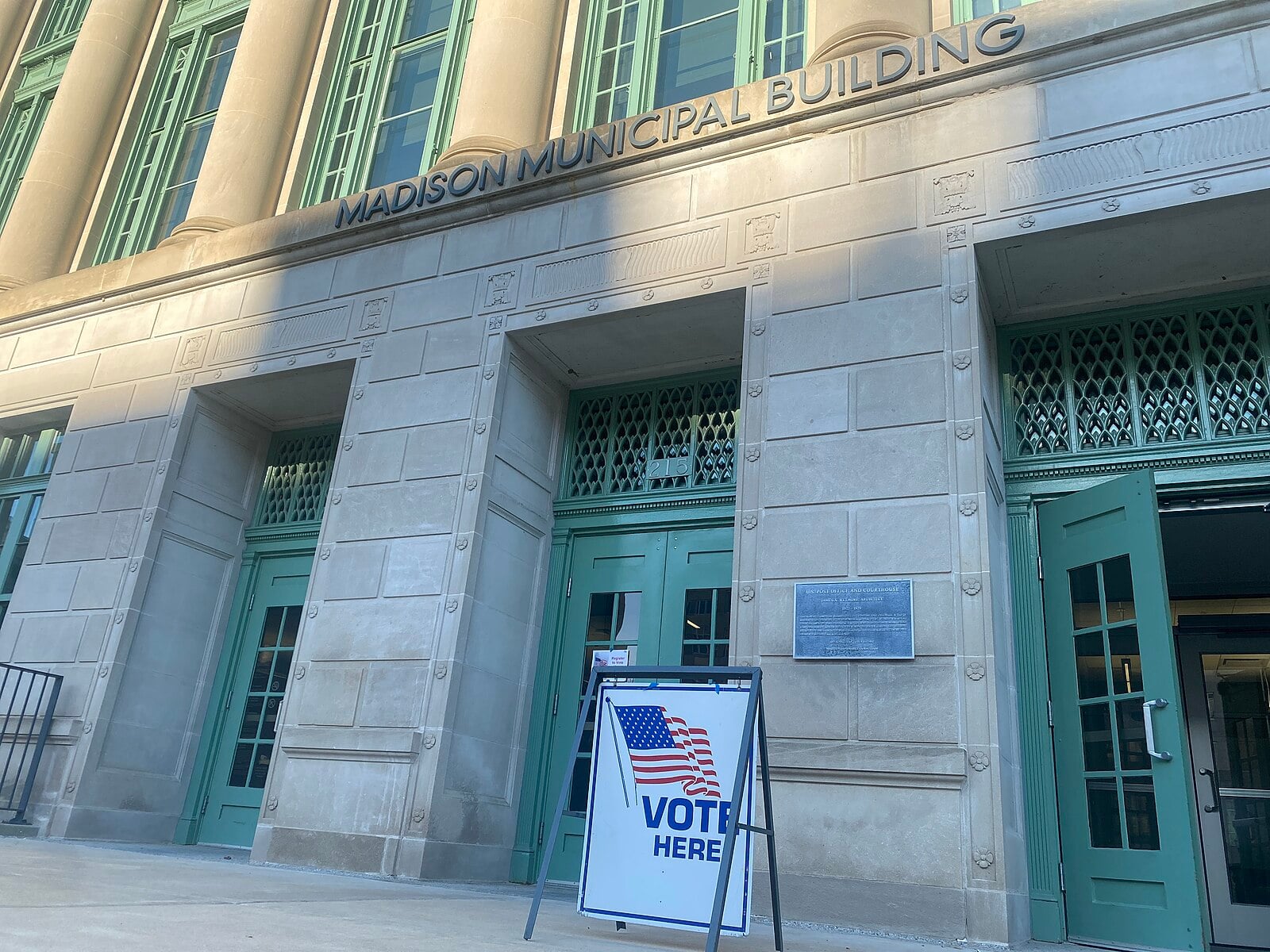A Vote Here sign outside the Madison Municipal Building during early voting in fall 2022