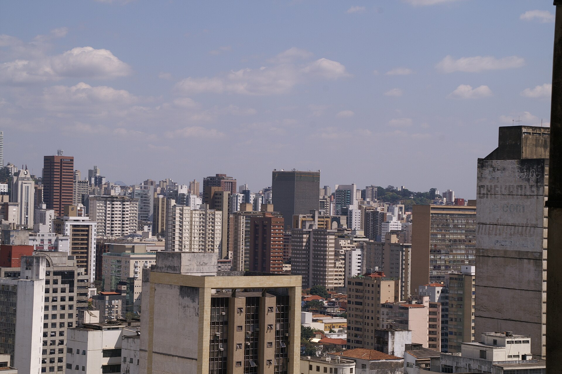 Apartment and office towers of downtown Belo Horizonte under a partly cloudy sky