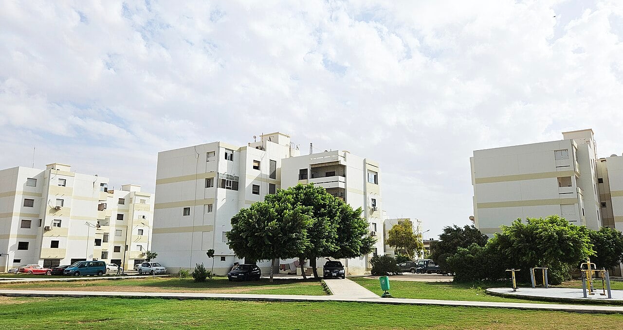 Apartment blocks with trees and a playground in a residential district of Benghazi, eastern Libya
