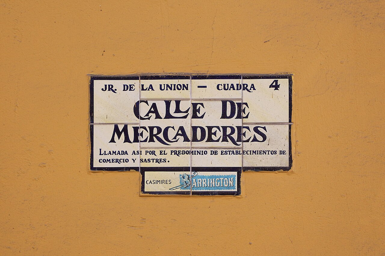 Tiled street sign reading Calle de Mercaderes on Jiron de la Union, Lima main shopping street