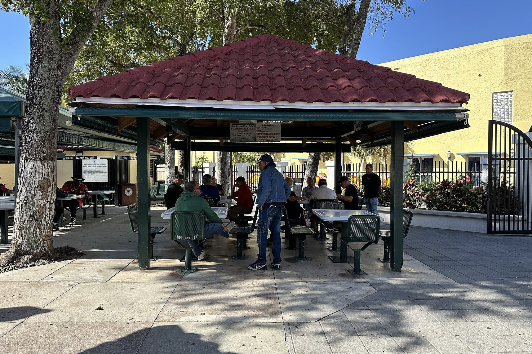 Men playing dominoes at Domino Park in Little Havana, Miami